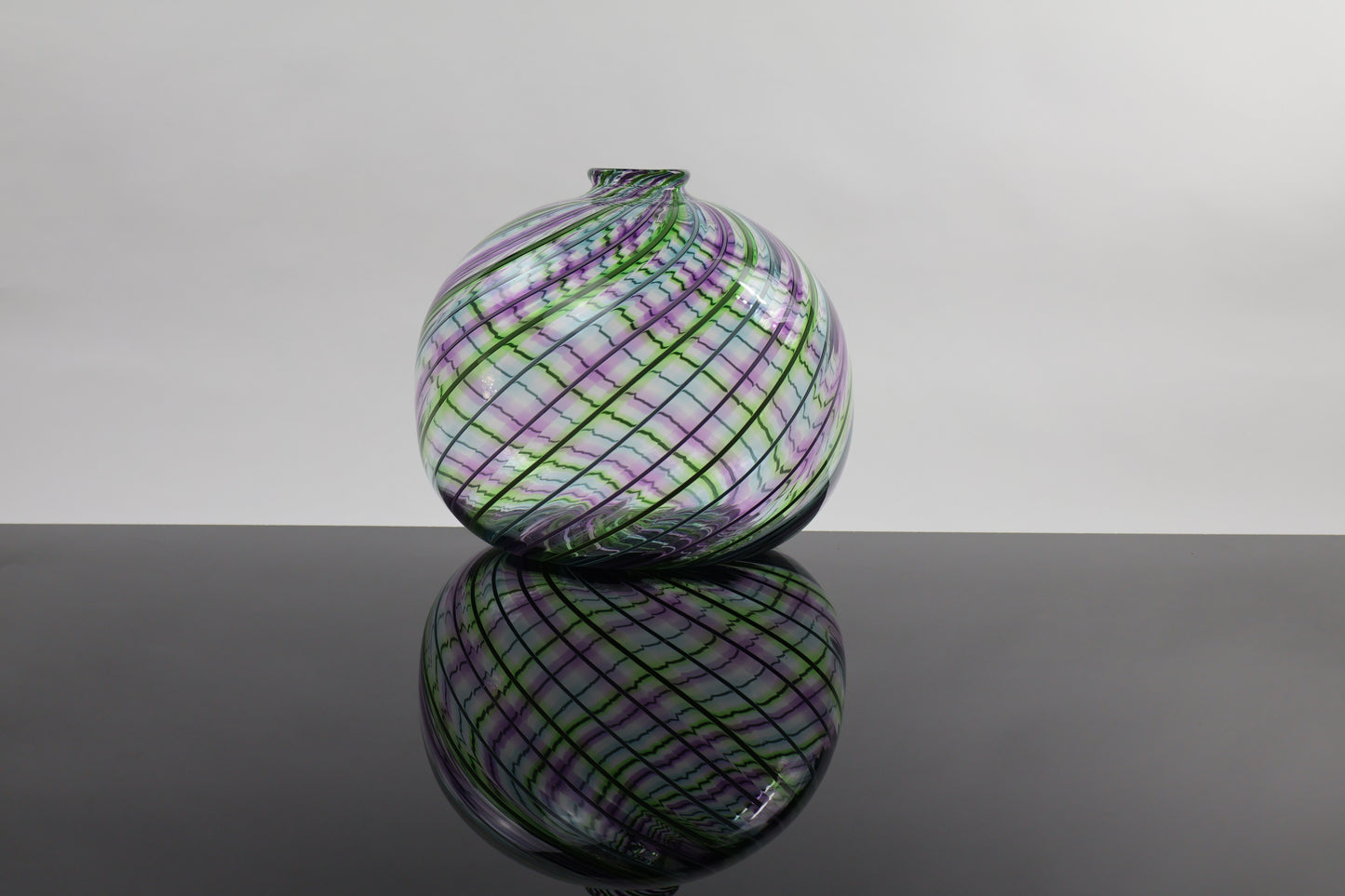 Round Multicolored Veiled Cane Bottle