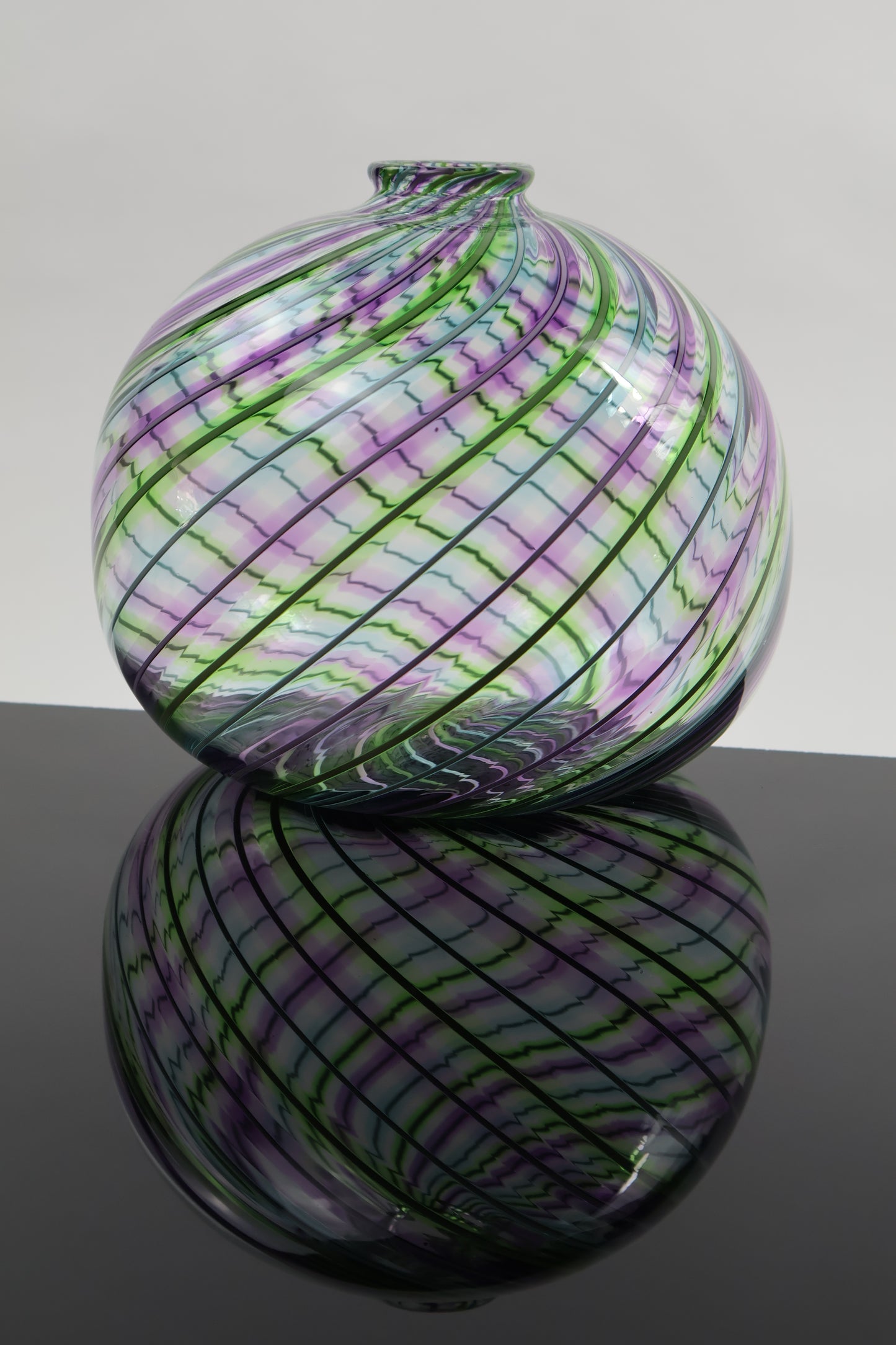 Round Multicolored Veiled Cane Bottle