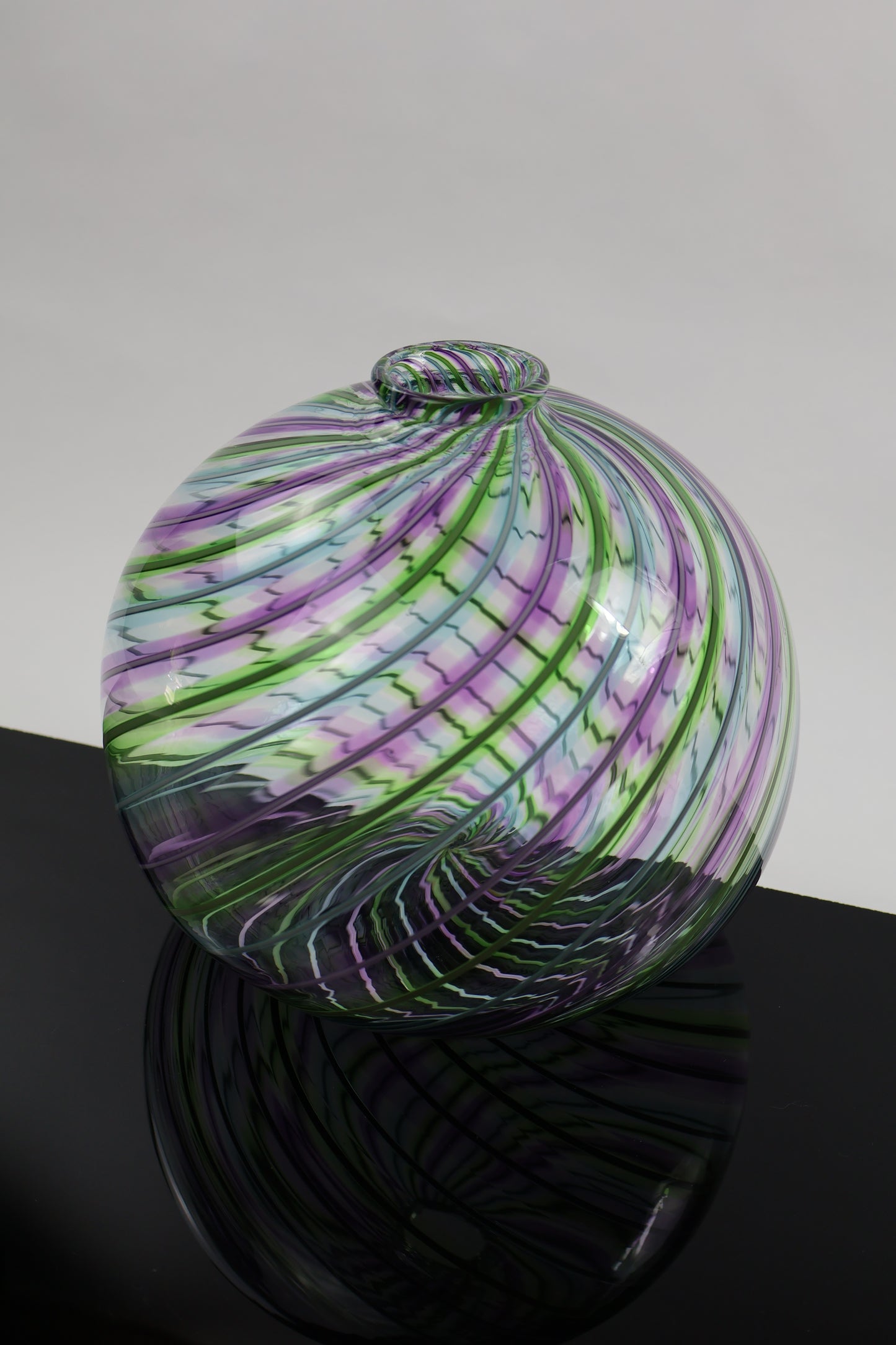 Round Multicolored Veiled Cane Bottle