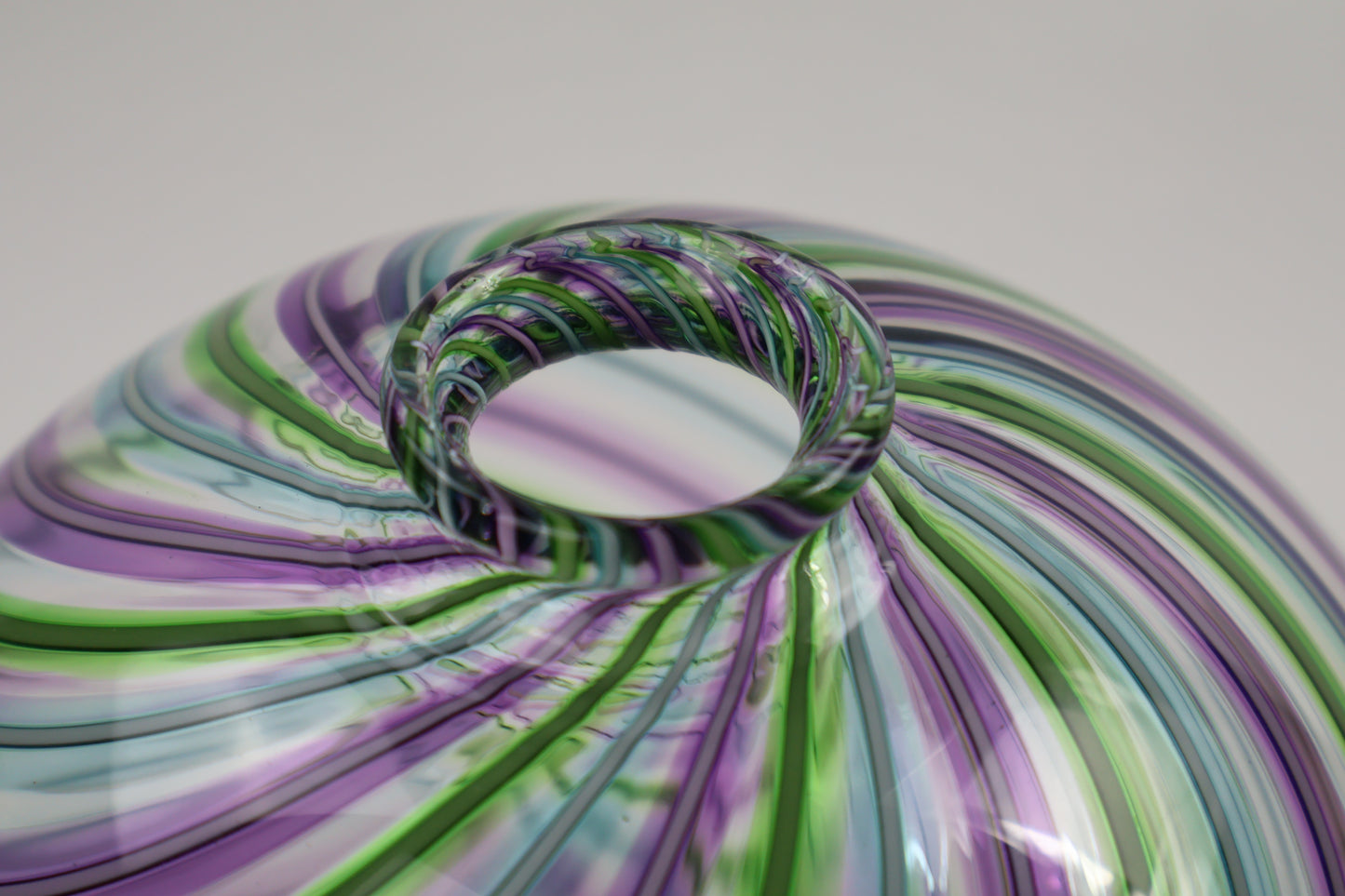 Round Multicolored Veiled Cane Bottle