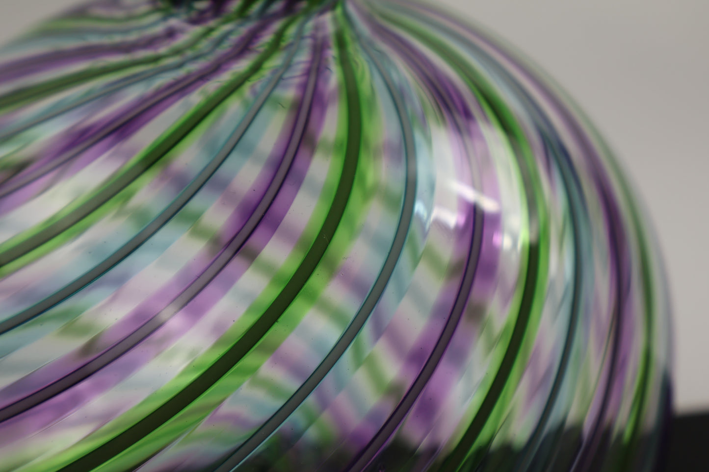 Round Multicolored Veiled Cane Bottle